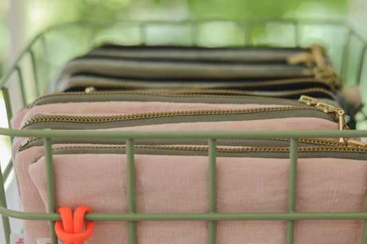 Pale pink or dove grey make-up pouch with Liberty lining and charms