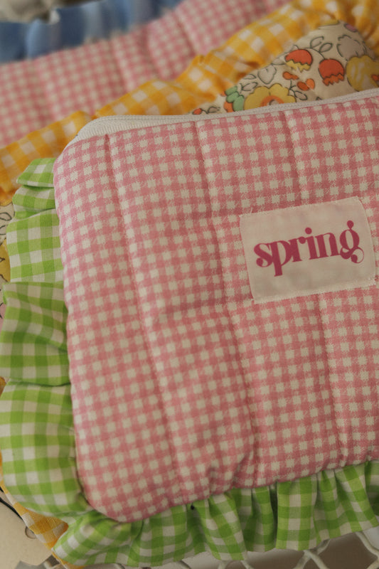 Make-up pouch with frill or charms