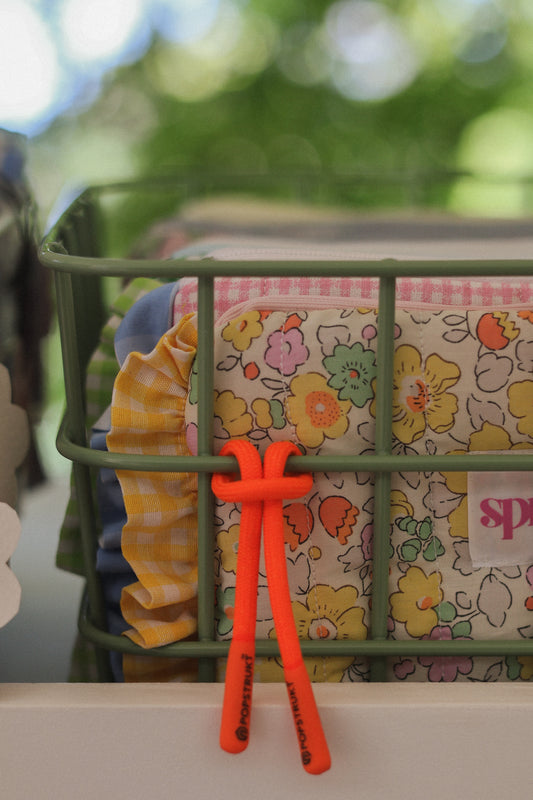 Make-up pouch with frill or charms